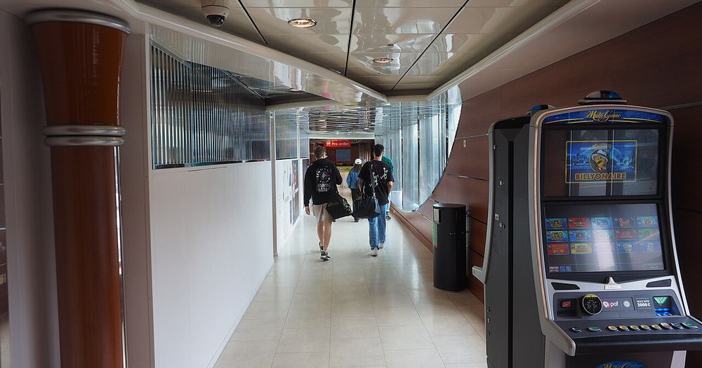 Corridor on Viking XPRS with slot machine in June 2024